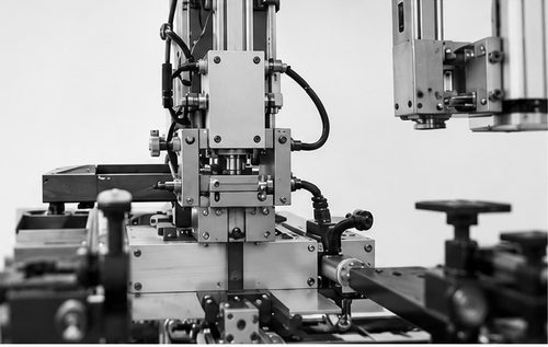 Close-up of a precision die-cutting and registration head